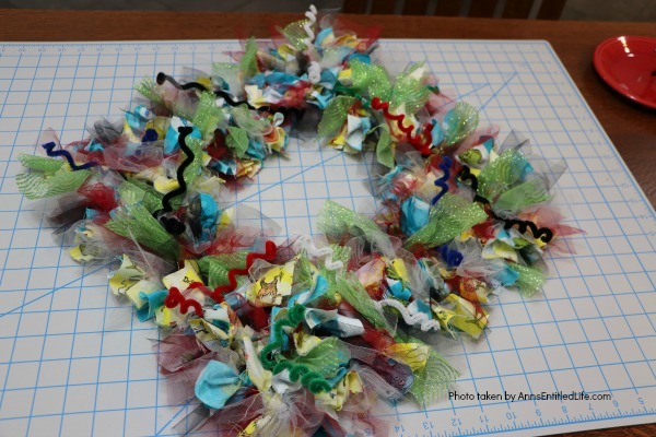 Wonky Dr. Seuss Inspired Wreath. This easy to make, wonky Dr. Seuss inspired wreath is great for all fans of Dr. Seuss literature and artwork. Fully customizable using these step-by-step instructions to reflect your favorite Dr. Seuss story, this wreath makes a wonderful gift for teachers, baby showers, a child's room, or your front door!