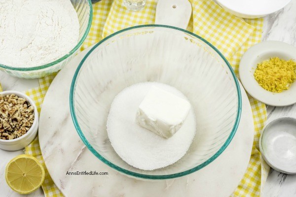 Lemon Snowball Cookie Recipe. The fresh, sweet-tart flavor make these Lemon Snowball Cookies are a change of pace Christmas Cookie. Easy to make, they are a welcome addition to your holiday cookie plate!