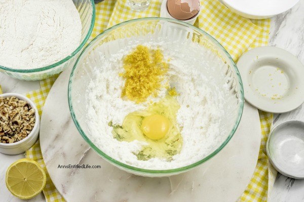 Lemon Snowball Cookie Recipe. The fresh, sweet-tart flavor make these Lemon Snowball Cookies are a change of pace Christmas Cookie. Easy to make, they are a welcome addition to your holiday cookie plate!