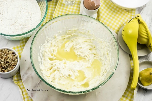 Lemon Snowball Cookie Recipe. The fresh, sweet-tart flavor make these Lemon Snowball Cookies are a change of pace Christmas Cookie. Easy to make, they are a welcome addition to your holiday cookie plate!