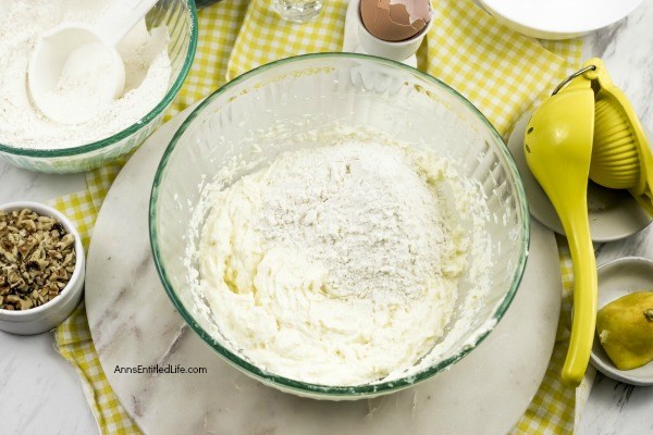 Lemon Snowball Cookie Recipe. The fresh, sweet-tart flavor make these Lemon Snowball Cookies are a change of pace Christmas Cookie. Easy to make, they are a welcome addition to your holiday cookie plate!