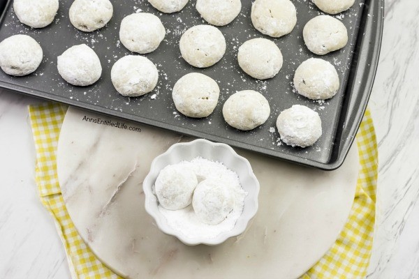 Lemon Snowball Cookie Recipe. The fresh, sweet-tart flavor make these Lemon Snowball Cookies are a change of pace Christmas Cookie. Easy to make, they are a welcome addition to your holiday cookie plate!