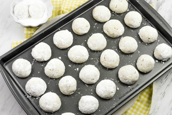 Lemon Snowball Cookie Recipe. The fresh, sweet-tart flavor make these Lemon Snowball Cookies are a change of pace Christmas Cookie. Easy to make, they are a welcome addition to your holiday cookie plate!