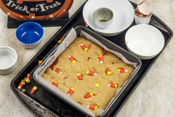 Peanut Butter Candy Corn Blondies Bars Recipe. These fun and easy to make Peanut Butter Candy Corn Blondies are the perfect treat for fall. These delicious little bars transport well, are great in lunch boxes, as an after-dinner dessert, or a late-night snack. Make these terrific Peanut Butter Candy Corn Blondies Bars today; your family will thank you!