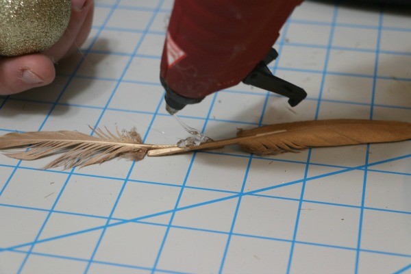 5 Minute Craft: Golden Snitch Ornament. Are you or your children Harry Potter fans? These easy to make golden snitch ornaments come together in under 5 minutes! Perfect for your tree, to give as a gift, or string for holiday decor.