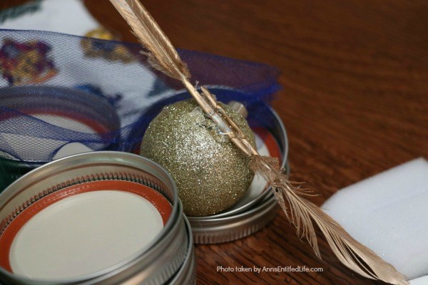 5 Minute Craft: Golden Snitch Ornament. Are you or your children Harry Potter fans? These easy to make golden snitch ornaments come together in under 5 minutes! Perfect for your tree, to give as a gift, or string for holiday decor.