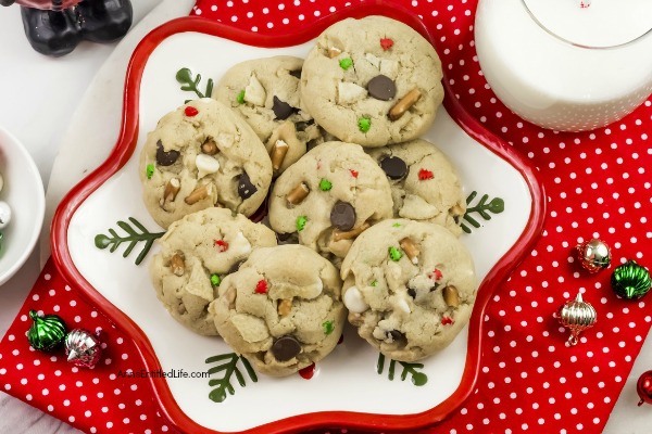 Santa's Trash Cookies Recipe. This holiday treat contains a little bit of everything including chocolate chips, white chocolate chips, and crushed potato chips in a perfect combination! These Santa's Trash Cookies will melt in your mouth with the perfect mixture of salty and sweet flavors. The next time you are looking for an easy-to-make drop cookie, try this excellent Santa's Trash Cookies recipe.
