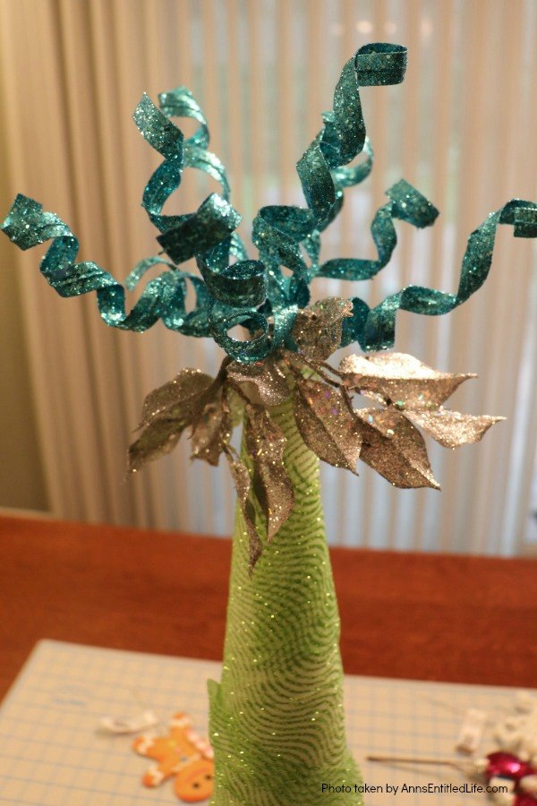 Unicorn Tree DIY. If you are looking for an easy to make Unicorn tree craft, this is the DIY for you! This is a beautiful, very quirky unicorn decoration full of bright, colors, as well as some sparkle and glitter. This wonky unicorn tree is a fun holiday, or unicorn party, decoration.