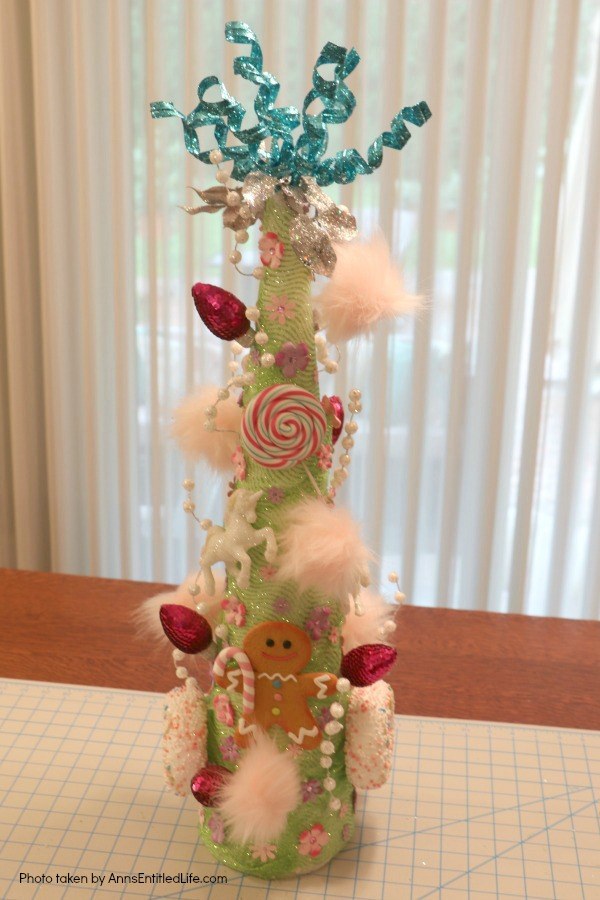 Unicorn Tree DIY. If you are looking for an easy to make Unicorn tree craft, this is the DIY for you! This is a beautiful, very quirky unicorn decoration full of bright, colors, as well as some sparkle and glitter. This wonky unicorn tree is a fun holiday, or unicorn party, decoration.