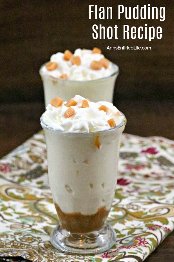 two flan pudding shot in a glass shot glass on top of a blue patterned napkin surrounded by caramel candies