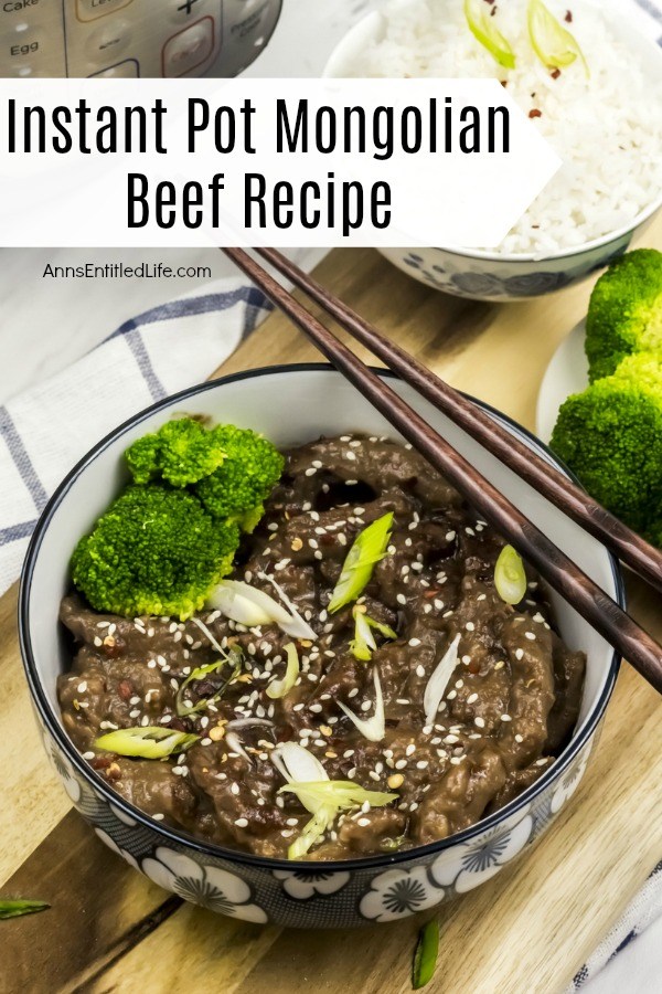 Overhead shot of Mongolian beef in a white, blue-rimmed bowl. The beef is sprinkled with sesame seeds. There are chopsticks resting across the bowl. There is a small bowl of rice in the upper right, a small bowl of broccoli is below that.