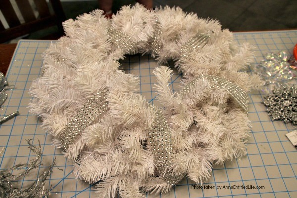 Let It Snow Wreath. This beautiful, blingy let it snow wreath is so easy to make! If you are looking for a fun and simple winter craft project to hang on your front door or over your fireplace mantel, you will want to make this sparkly winter wreath.