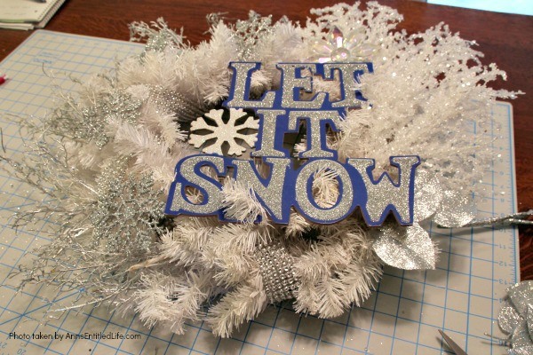 Let It Snow Wreath. This beautiful, blingy let it snow wreath is so easy to make! If you are looking for a fun and simple winter craft project to hang on your front door or over your fireplace mantel, you will want to make this sparkly winter wreath.