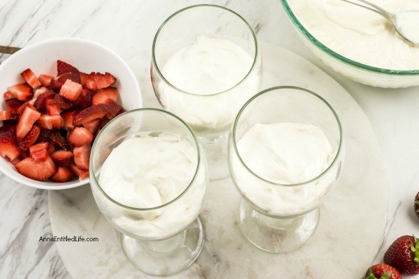 Strawberry Shortcake Cheesecake Parfait Recipe. This easy-to-make, from scratch, strawberry shortcake cheesecake parfait comes together in no time flat! Your friends and family will love this tasty delight. A fantastic dessert or snack any time of the year, this terrific strawberry parfait recipe is a party for your taste buds.