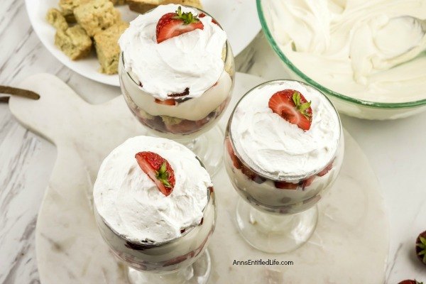 Strawberry Shortcake Cheesecake Parfait Recipe. This easy-to-make, from scratch, strawberry shortcake cheesecake parfait comes together in no time flat! Your friends and family will love this tasty delight. A fantastic dessert or snack any time of the year, this terrific strawberry parfait recipe is a party for your taste buds.