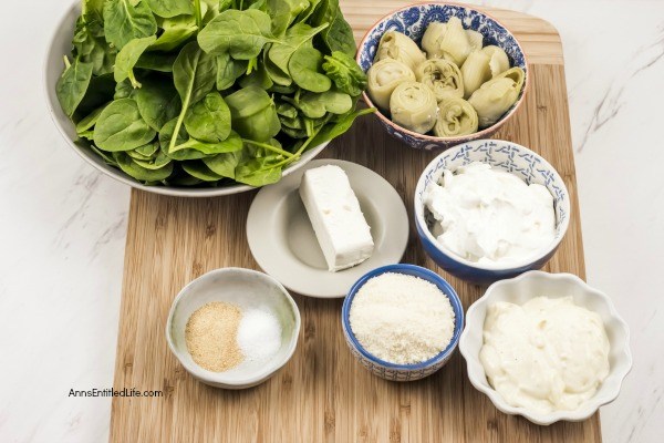 Fresh Spinach Artichoke Hot Dip Recipe. This easy to make spinach and artichoke dip recipe takes the classic spinach dip to a whole new level. Made with cream cheese, sour cream, spinach, and artichoke hearts, this dip is perfect for your next party, to serve as an appetizer, or as a game day snack! If you are looking to up your dip-game try this amazing spinach and artichoke dip. Your friends and family will love it!