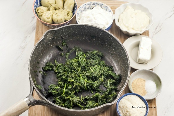 Fresh Spinach Artichoke Hot Dip Recipe. This easy to make spinach and artichoke dip recipe takes the classic spinach dip to a whole new level. Made with cream cheese, sour cream, spinach, and artichoke hearts, this dip is perfect for your next party, to serve as an appetizer, or as a game day snack! If you are looking to up your dip-game try this amazing spinach and artichoke dip. Your friends and family will love it!