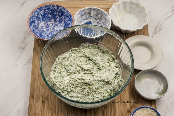 Fresh Spinach Artichoke Hot Dip Recipe. This easy to make spinach and artichoke dip recipe takes the classic spinach dip to a whole new level. Made with cream cheese, sour cream, spinach, and artichoke hearts, this dip is perfect for your next party, to serve as an appetizer, or as a game day snack! If you are looking to up your dip-game try this amazing spinach and artichoke dip. Your friends and family will love it!