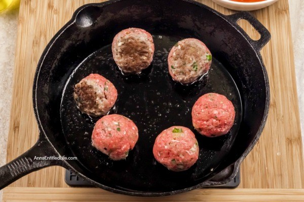 Cheesy Meatball Bake Recipe. This fresh take on the classic cheesy meatball casserole recipe is made in a skillet pan, taking this recipe from stove to oven in one cooking container. Take your ground beef to new heights; make this easy cheesy meatball bake recipe for dinner tonight! Yum!