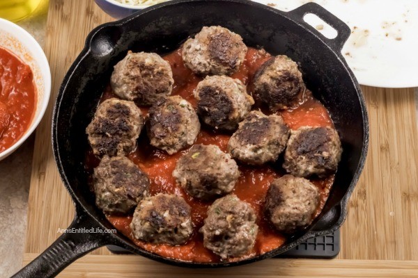 Cheesy Meatball Bake Recipe. This fresh take on the classic cheesy meatball casserole recipe is made in a skillet pan, taking this recipe from stove to oven in one cooking container. Take your ground beef to new heights; make this easy cheesy meatball bake recipe for dinner tonight! Yum!
