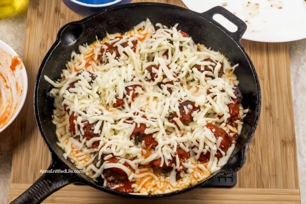 Cheesy Meatball Bake Recipe. This fresh take on the classic cheesy meatball casserole recipe is made in a skillet pan, taking this recipe from stove to oven in one cooking container. Take your ground beef to new heights; make this easy cheesy meatball bake recipe for dinner tonight! Yum!