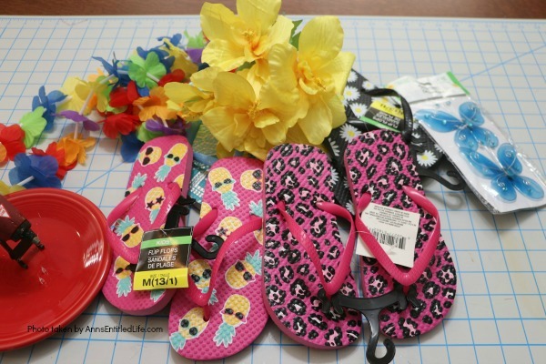 Flip Flops Door Hanger: Dollar Store Craft. Make this cute flip flop door hanger in no time flat with materials found at your local dollar store! This quick and easy project is inexpensive and great for summertime, tropical parties, or classroom decorations.