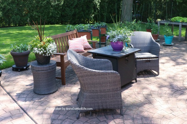 Backyard Patio Oasis. This is our backyard patio oasis. It is where we can go to relax on a beautiful summer day. Entertaining is a breeze with the three different seating areas, and I still have a patio container garden!