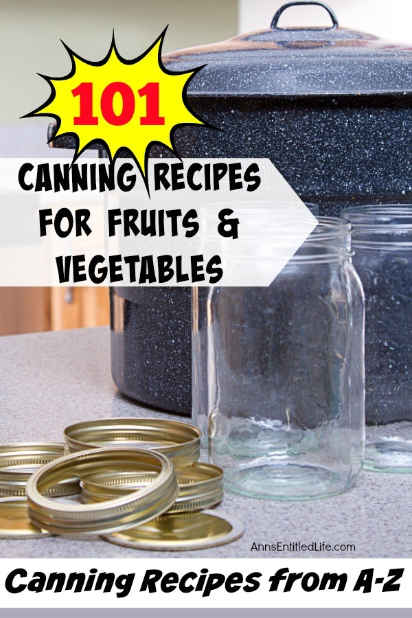 Blue canner is offset to the right, two canning jars are set in front of it. Lids are to the left of that. On a blue counter.