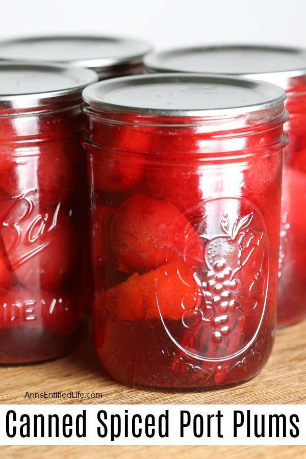 Close-up of pint jars of canned red plums