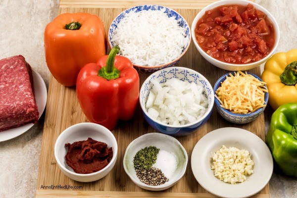 Stuffed Bell Peppers Recipe. These stuffed bell peppers are a classic recipe. Made with a mixture ground beef, rice, onions, tomatoes, and spices, this easy to make bell peppers recipe is the perfect family dinner any time of year!