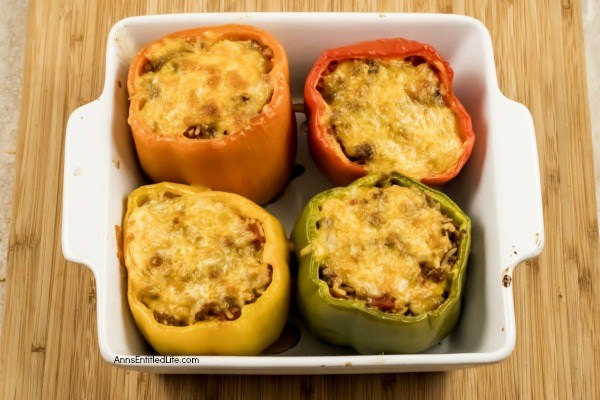 Stuffed Bell Peppers Recipe. These stuffed bell peppers are a classic recipe. Made with a mixture ground beef, rice, onions, tomatoes, and spices, this easy to make bell peppers recipe is the perfect family dinner any time of year!