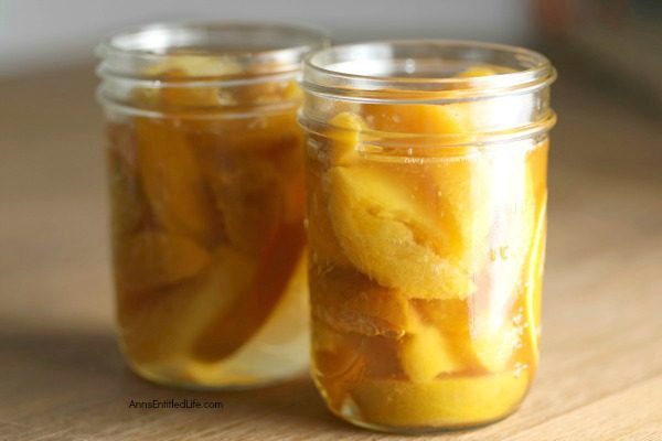 Canned Drunken Vanilla Bourbon Peaches Recipe. Canning peaches is a delicious way to preserve your fresh fruit peaches to eat when the peach season is over. This terrific drunken vanilla bourbon peaches water bath canning recipe is a great way to process your peaches. Can now, enjoy later! 