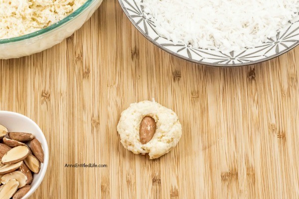 No-Bake Coconut Balls Recipe. It is a cookie! It is a candy! It is two treats in one. This is an easy to make, creamy and delicious no-bake coconut ball recipe with a nutty surprise in the middle. These coconut balls are delightful sweet treat your whole family will enjoy. Yum! 