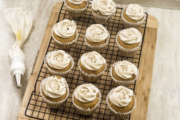 Pumpkin Cheesecake Cupcakes Recipe. Now that the weather has turned cooler, it is pumpkin season! These terrific cheesecake filled pumpkin cupcakes are frosted with an easy to make, complimentary brown sugar butter cream frosting. Whip up a batch tonight for lunchboxes, after-school snack, or dessert.