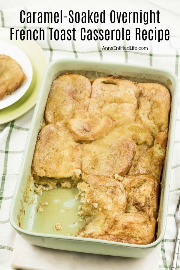 An overhead view of a pan of caramel-soaked French toast casserole with a serving removed. That serving is plated in the upper left, and in the upper right is a green and white checked dishcloth.