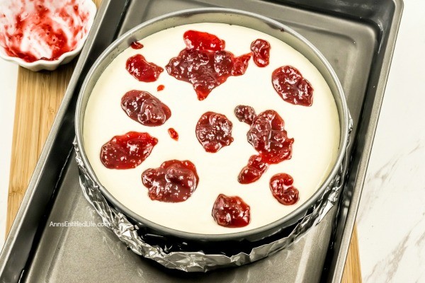 Cranberry Sauce Cheesecake Recipe. This delicious cheesecake is perfect for holiday dinners, parties, and get-togethers. It is a creamy and delectable cheesecake, with just a touch of tartness and spice from the gingerbread crust. Go ahead, delight your taste buds with this Cranberry Sauce Cheesecake this holiday season!