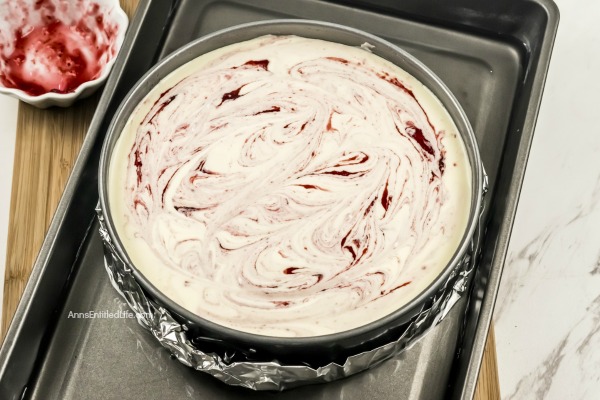 Cranberry Sauce Cheesecake Recipe. This delicious cheesecake is perfect for holiday dinners, parties, and get-togethers. It is a creamy and delectable cheesecake, with just a touch of tartness and spice from the gingerbread crust. Go ahead, delight your taste buds with this Cranberry Sauce Cheesecake this holiday season!