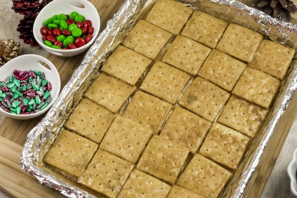 Christmas Crack Candy Recipe. This Christmas crack candy recipe is a delicious, old fashioned blast from the past. It is great as a Christmas or holiday gift and is a very simple recipe. The perfect combination of salty and sweet comes together to form what some call saltine candy.  This toffee flavored candy can be quite addicting.