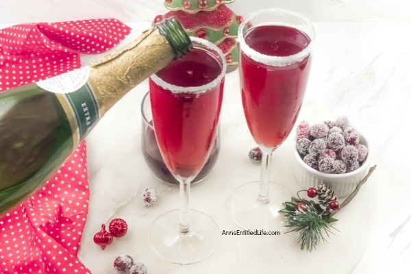Cranberry Mimosa Drink Recipe. This cranberry mimosa drink is a festive holiday beverage. This is a perfect holiday drink for your holiday brunch, it can also be served at cocktail parties, to ring in the New Year, or for any other holiday celebration you may have.