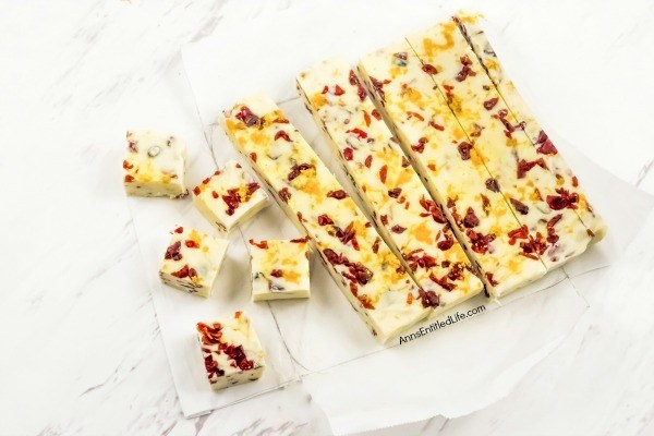 Cranberry Orange Fudge Recipe. Cranberry and orange is a terrific pairing and this sweet, creamy, and delicious fudge recipe incorporates that fantastic taste combination for a perfect holiday fudge recipe. Using just five-ingredients, this fabulous cranberry orange fudge recipe comes together quickly. This is a wonderful holiday sweet treat.