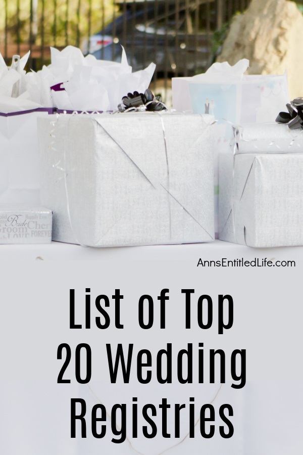 A table filled with white, wrapped, wedding gifts.