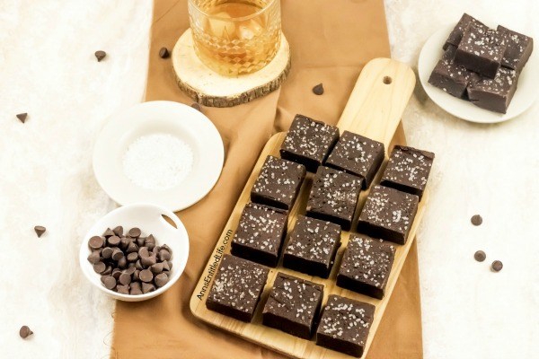 Salted Dark Chocolate Bourbon Fudge Recipe. Rich, intense, yet with a hint of salt and sweetness, this salted dark chocolate bourbon fudge recipe is a flavor explosion for your taste buds. This may be the best fudge recipe you will ever make.  Simple to make, this fudge recipe is terrific for sharing, gifting, or when you want to indulge at home.