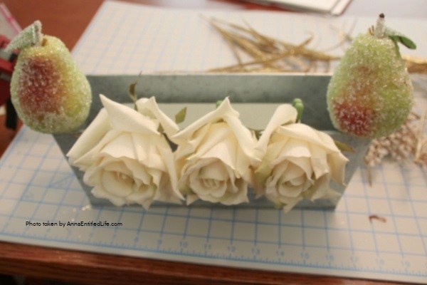 Winter Pear and Floral Table Centerpiece. This homemade pear and floral centerpiece is a 15-minute craft that is so easy to make! Using a little sparkle, a few elegant flowers, and a tad of rustic, this terrific tabletop decoration is at perfect for nearly any type of home décor.