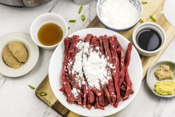 Instant Pot Mongolian Beef Recipe. Mongolian beef is a classic dinner entree, and this instant pot recipe is simple to make. Serve with rice and a green vegetable for a delicious dinner your entire family will love.