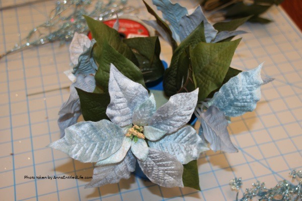 Winter Ice Blue Bucket Craft. This happy little winter ice blue bucket craft comes together quickly and easily for a sweet little side table decor piece that is perfect for the winter season. I have this in my foyer to give the endurance a pop of color for the winter season.