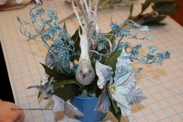 Winter Ice Blue Bucket Craft. This happy little winter ice blue bucket craft comes together quickly and easily for a sweet little side table decor piece that is perfect for the winter season. I have this in my foyer to give the endurance a pop of color for the winter season.