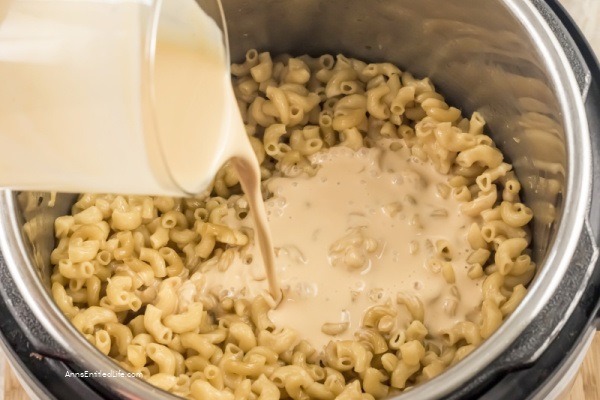 Instant Pot Macaroni and Cheese Recipe. You cannot go wrong with a classic dish like this instant pot macaroni and cheese recipe! Switch up your traditional way of making mac and cheese and forget the boxed version and make it with your Instant Pot instead. Full of gooey cheddar cheese, soft macaroni, and just the right spices, this dish is unforgettably delicious.