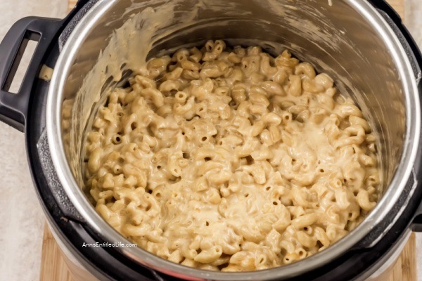 Instant Pot Macaroni and Cheese Recipe. You cannot go wrong with a classic dish like this instant pot macaroni and cheese recipe! Switch up your traditional way of making mac and cheese and forget the boxed version and make it with your Instant Pot instead. Full of gooey cheddar cheese, soft macaroni, and just the right spices, this dish is unforgettably delicious.