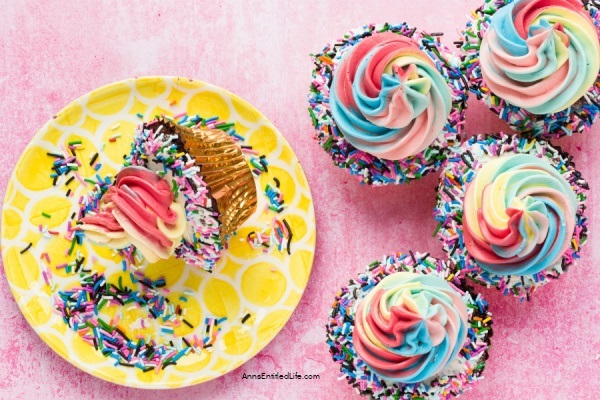 Rainbow Party Chocolate Cupcakes Recipe. If you are looking for an adorable dessert for a celebration, these Rainbow Party Chocolate Cupcakes are a perfect choice! Rich, decadent chocolate cupcakes are topped with a rainbow, classic buttercream frosting that is out of this world. This dessert is sure to be a crowd-pleaser, whether you are baking for a party or family and friends.