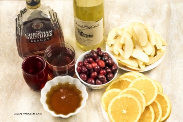 Holiday Cranberry Sangria Recipe. Need a fantastic sangria recipe for a holiday get-together or party? This holiday cranberry sangria recipe is light and refreshing yet packed with flavor and oh so easy to make! It is the best sangria recipe for holiday celebrations; a real crowd-pleaser.